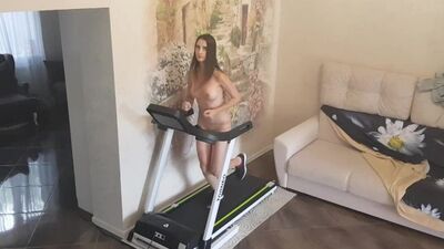 Naked girl on a treadmill