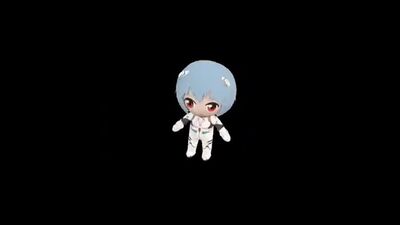 A boneca de peluche gira ao som da música do Evangelion