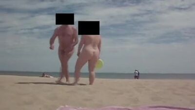 Mr & Mrs Voyeurist00 on Studland Naturist Beach Frizbeeing