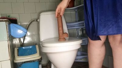 Curvy MILF Pissing and Fucking Her Dildo in the Toilet