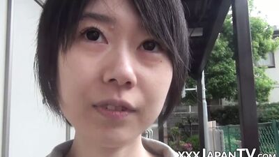 Young Japanese Woman Shows off Butt and Twat