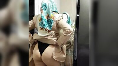 Headscarf-Wearing Undressing Video: Turkish MILF