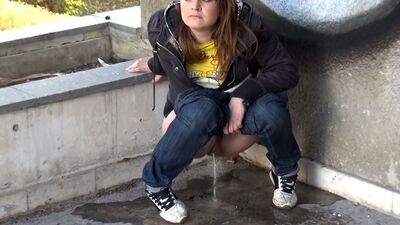 Naughty Brunette Makes Huge Puddle