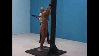 A girl being brutally whipped