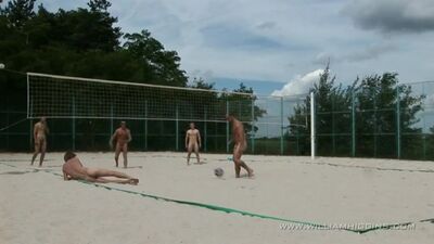 Naked guys are playing volleyball