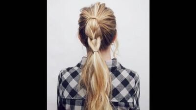 Une jolie tresse réalisée avec des élastiques : la tendance de la saison