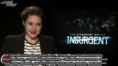 Sous-titres en russe : Interview de Shailene pour « AMC Movie News » ; elle évoque le tournage de différentes scènes dans « Insurgent » et découvre ce qu'est le « shippage »